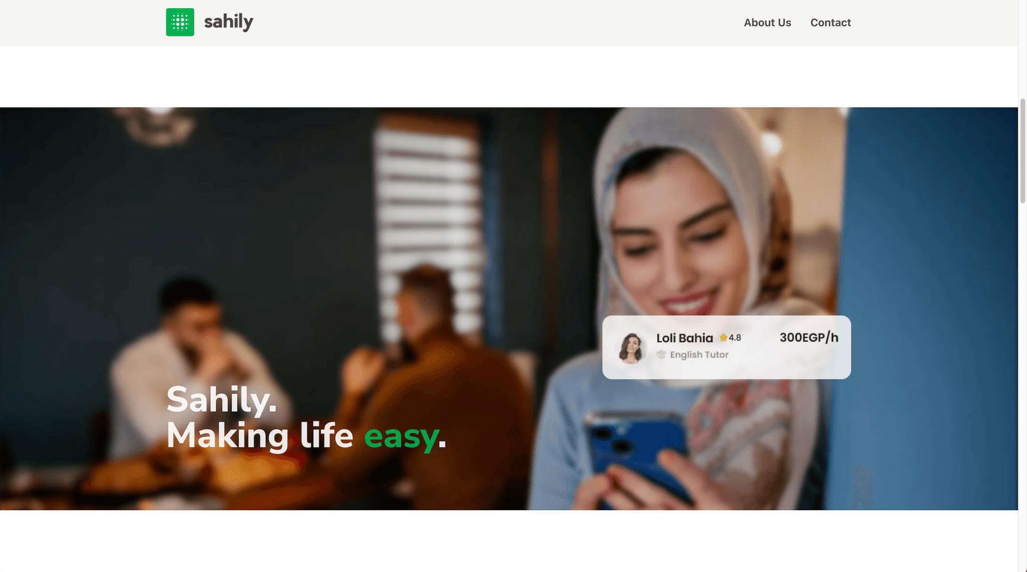 Screenshot of website displaying an image section with a hijabi girl using her phone to browse tutors, and text in the foreground that reads: 'Sahily, making life easy.'